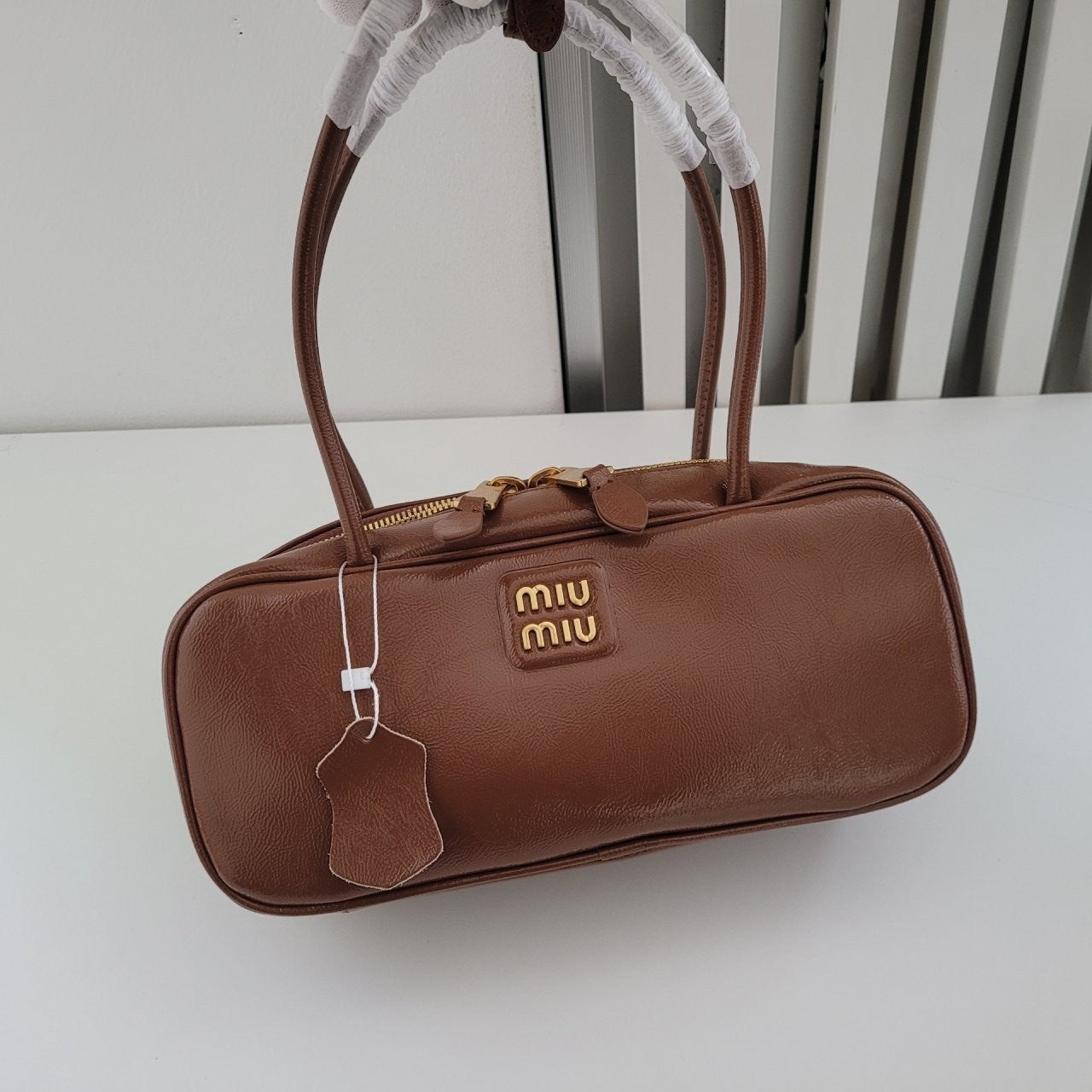 💕 미*** 나플락 페이턴트 가죽 보 백